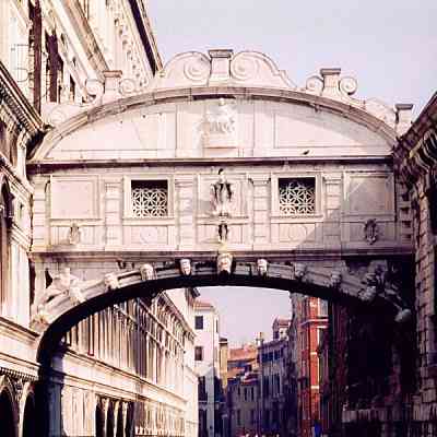 If you look at the Bridge of Sighs in Venice, it does look just like a white lace mask.